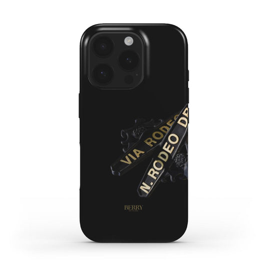 Trendy black phone case with golden and multicolored street sign design, featuring a stylish aesthetic perfect for a girly and feminine look.
