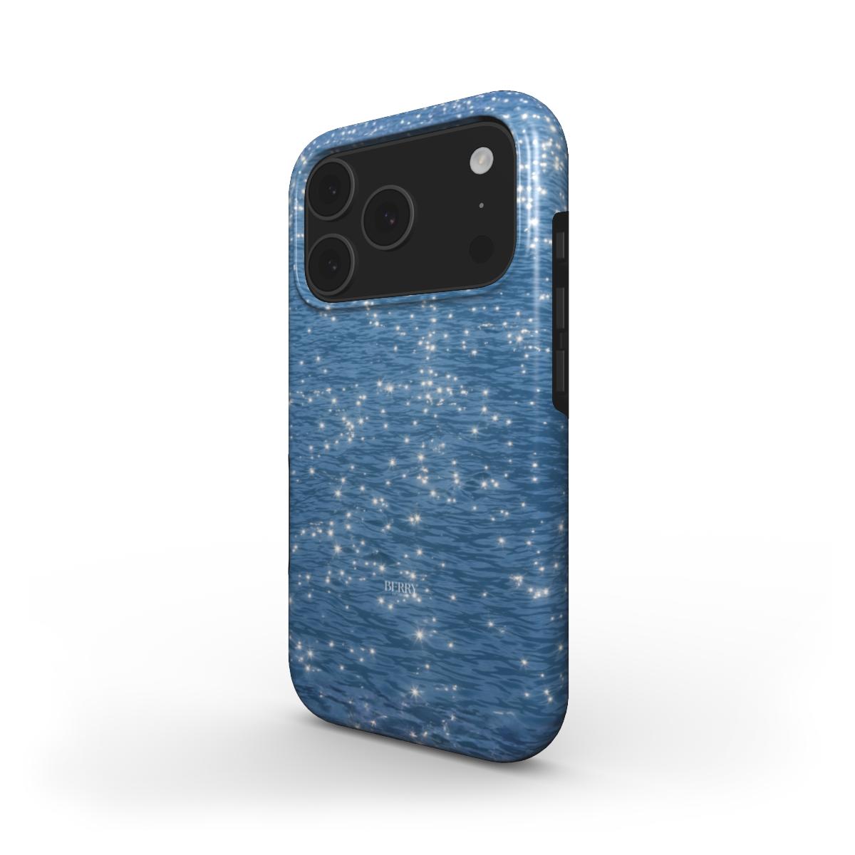 Trendy blue phone case with a sparkling multicolored pattern, perfect for adding a feminine and aesthetic touch to your style this summer.