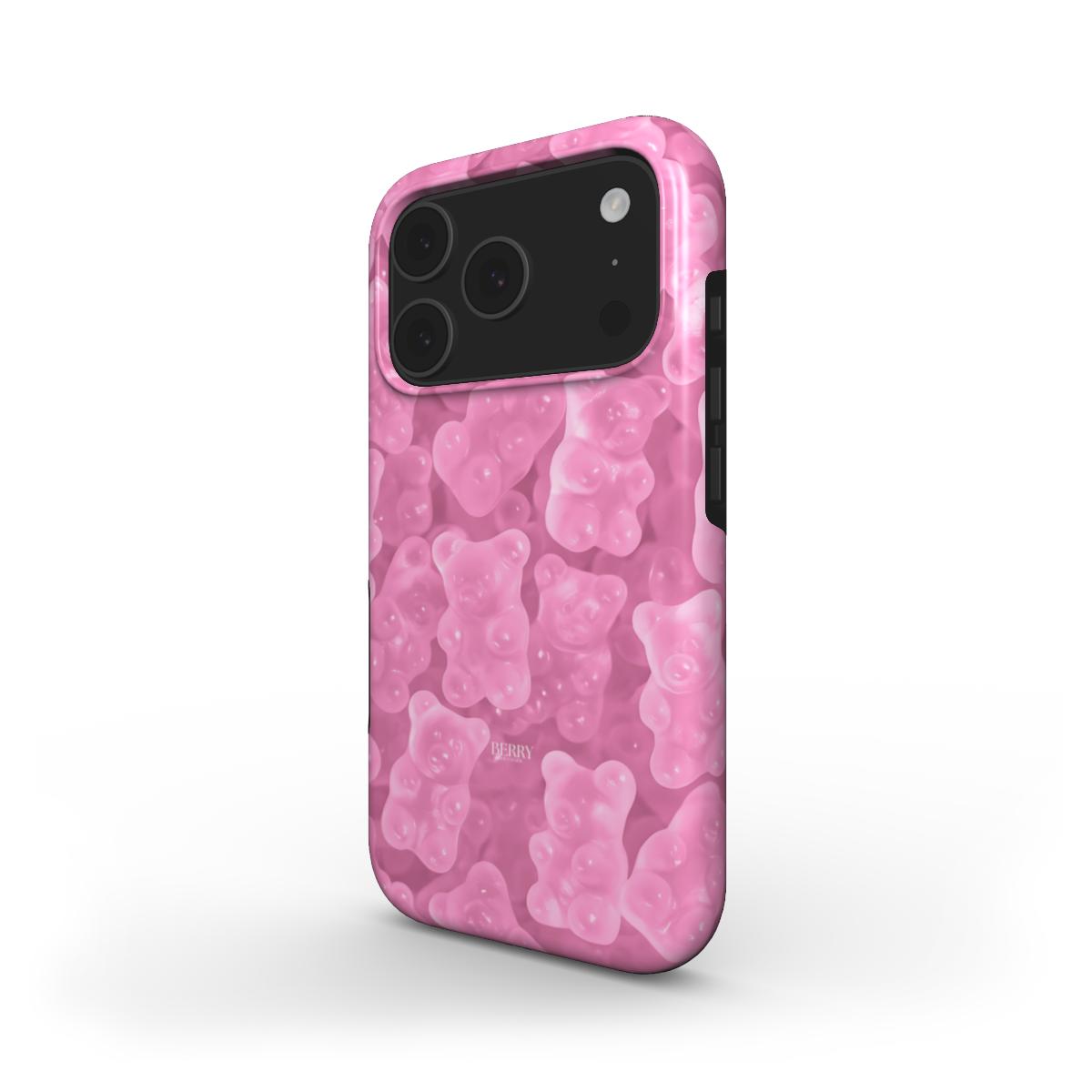 Trendy phone case with a pink, multicolored gummy bear pattern offering a girly, feminine, and popular aesthetic perfect for that girl vibe.