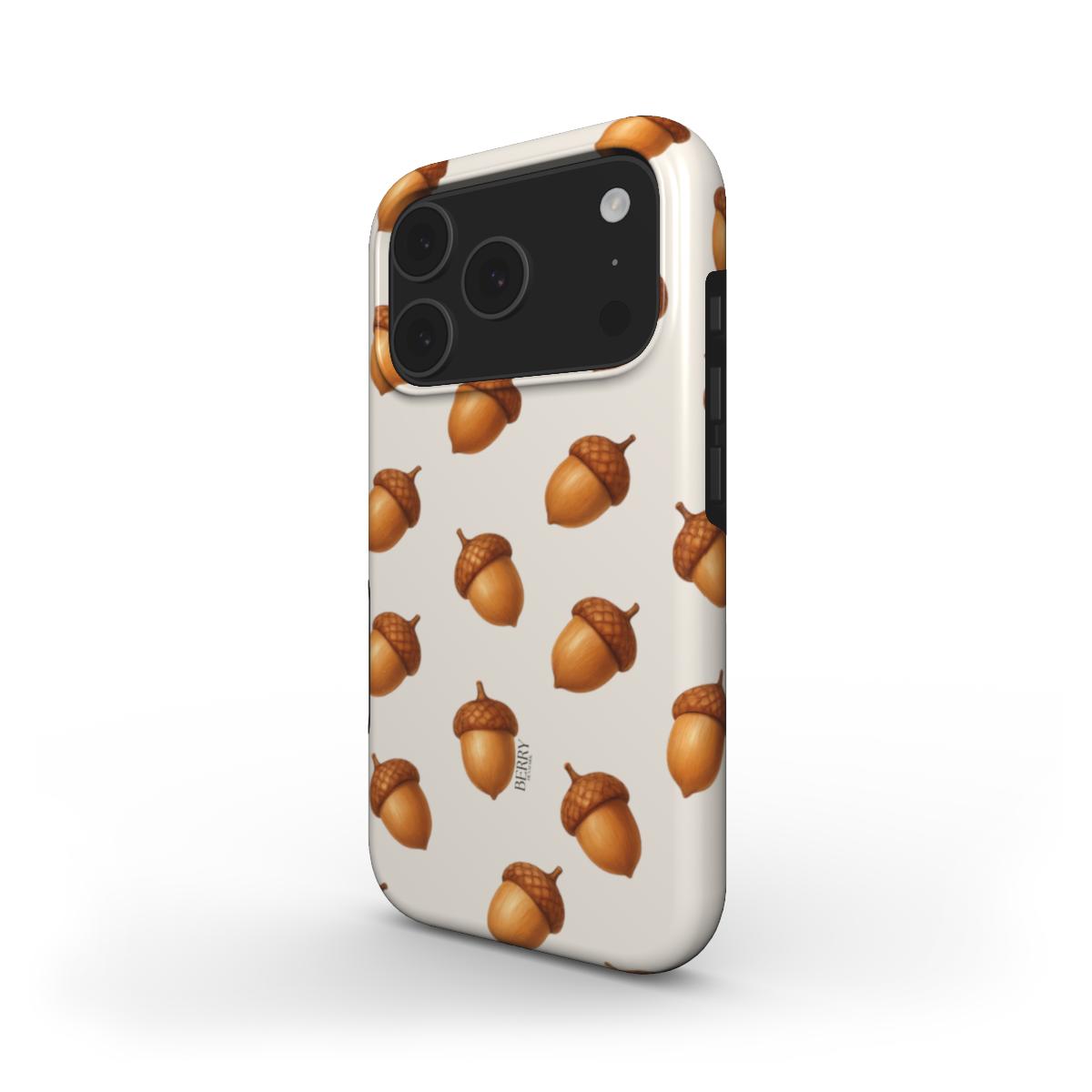 Trendy phone case with a brun, beige, and multicolored acorn pattern, featuring a stylish and feminine design perfect for a fashionable look.