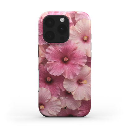Phone case featuring a trendy floral pattern in pink and red hues, showcasing a feminine and beautiful aesthetic with multicolored blush flowers.