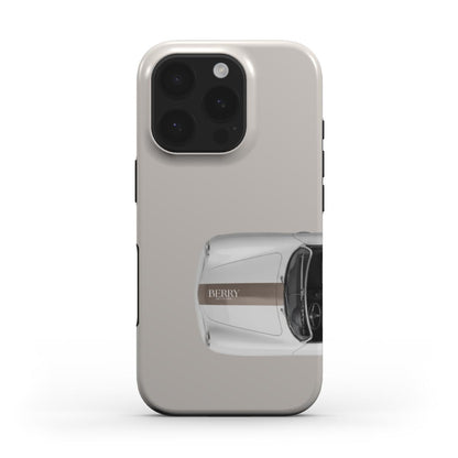 Trendy beige phone case featuring a minimalist top view of a classic car in brown and beige tones, combining feminine and aesthetic style.