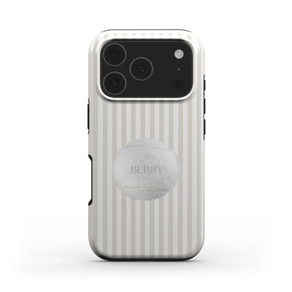 Trendy phone case with beige and white stripes featuring a stylish white tennis ball design for a chic and feminine look.