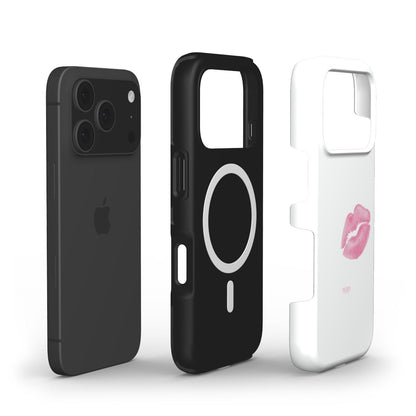 Trendy phone case set with a sleek black design and a feminine white case featuring a pink lips print in a girly, aesthetic style.