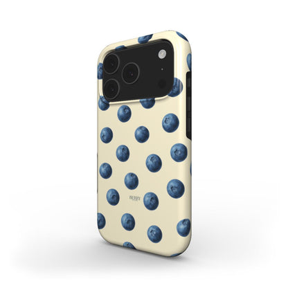Trendy phone case featuring a playful blue and yellow multicolored pattern of blueberries on a soft cream background for a feminine and aesthetic look.