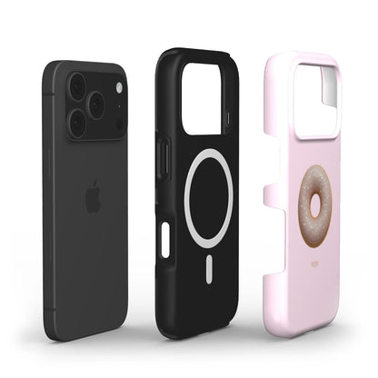 Trendy feminine phone case in pink with a stylish gold and beige donut design, combining playful and elegant aesthetics for a popular girly look.