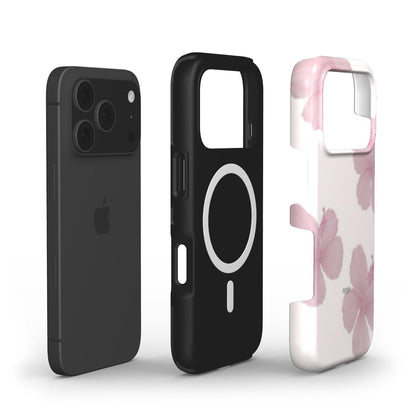 Black and soft pink floral phone cases displayed next to a sleek black smartphone, showcasing trendy, feminine, and aesthetic protective designs.