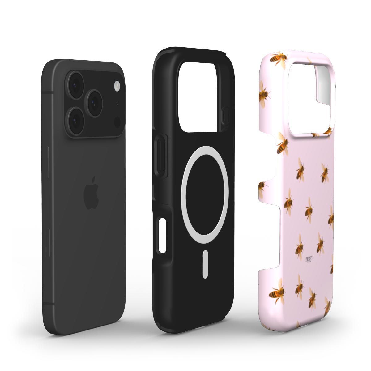 Trendy pink phone case with a feminine bee pattern, designed for a stylish and aesthetic look with a modern MagSafe black inner layer.