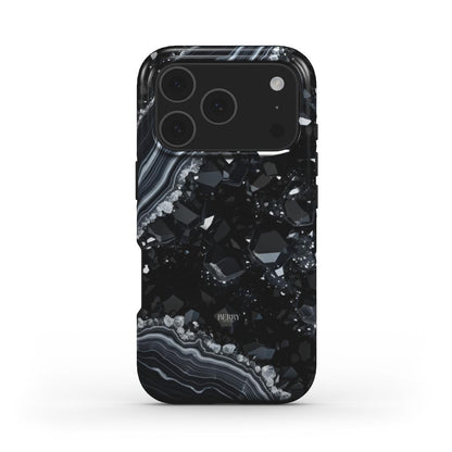 Trendy black phone case featuring a sparkling diamond-like textured pattern with elegant striped accents for a feminine and stylish look.