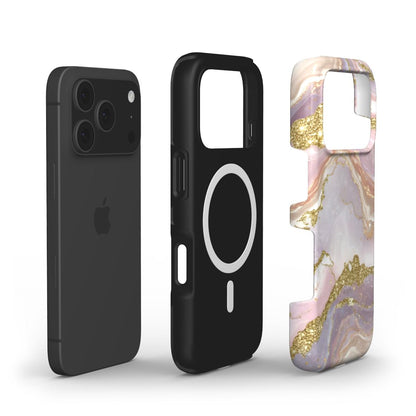 Black MagSafe compatible phone case with a separate pink, gold, and rose gold marble-patterned decorative outer shell designed for a stylish, feminine look.