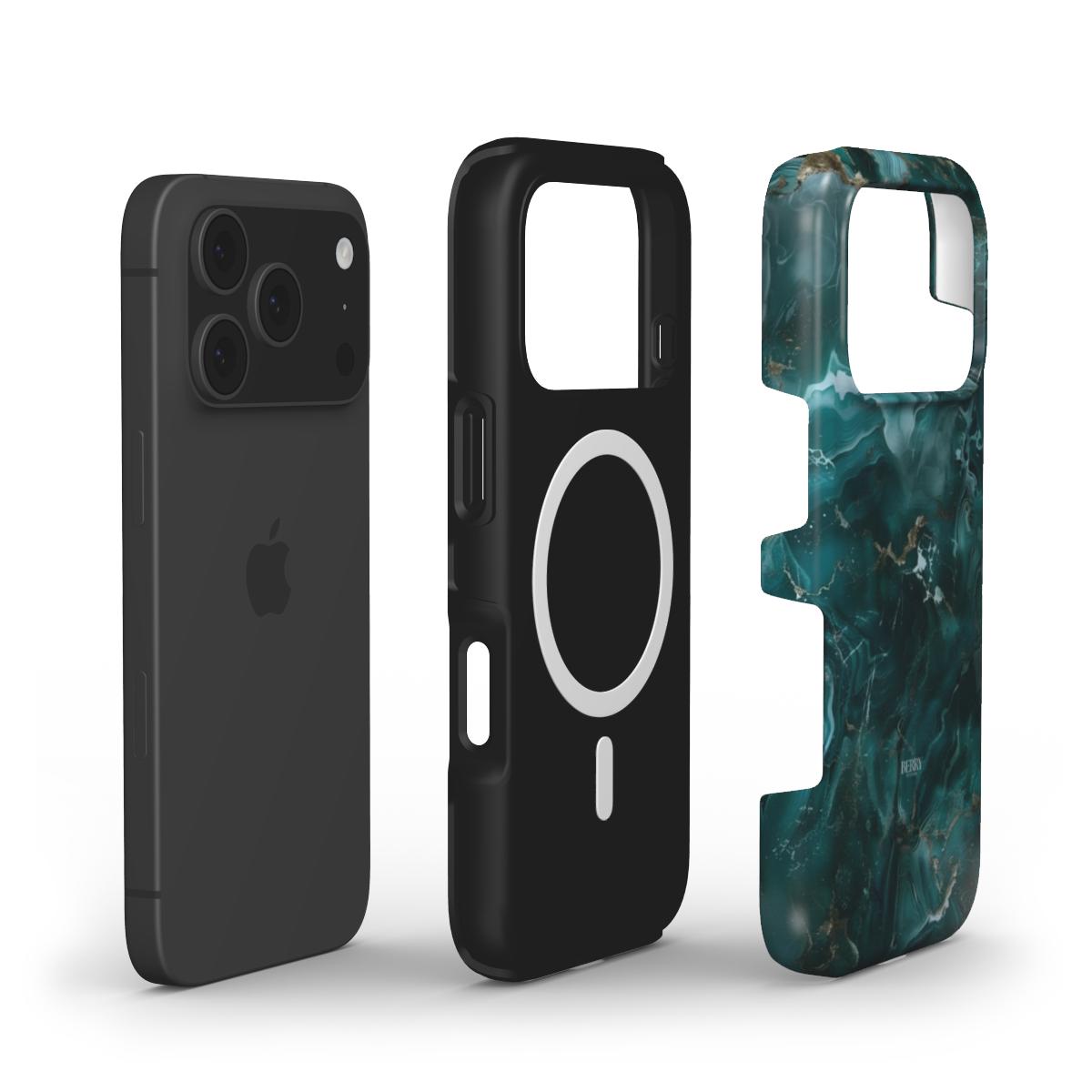 Black smartphone with two detachable protective cases, one plain black with circular detail and one with green marble quartz pattern, stylish and trendy accessory design.