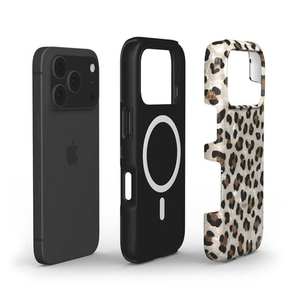 Trendy phone case with a stylish MagSafe-compatible black inner layer and a feminine, aesthetic leopard print outer shell in gold, brown, multicolor, beige, and black.