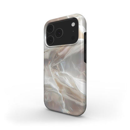 Trendy phone case with a beige, white, and multicolored flowing marble pattern offering a feminine and elegant aesthetic appeal.
