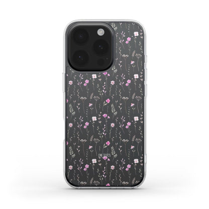 Trendy phone case with a clear, multicolored spring flower pattern, featuring delicate pink and white blossoms on a dark background for a feminine touch.