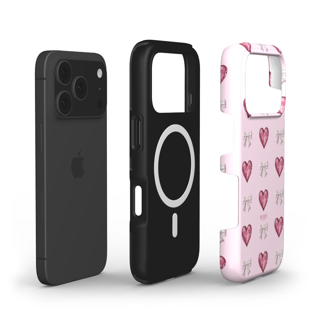 Trendy pink phone case with flerfarvet heart and bow patterns, designed to add a feminine and aesthetic touch to any phone.