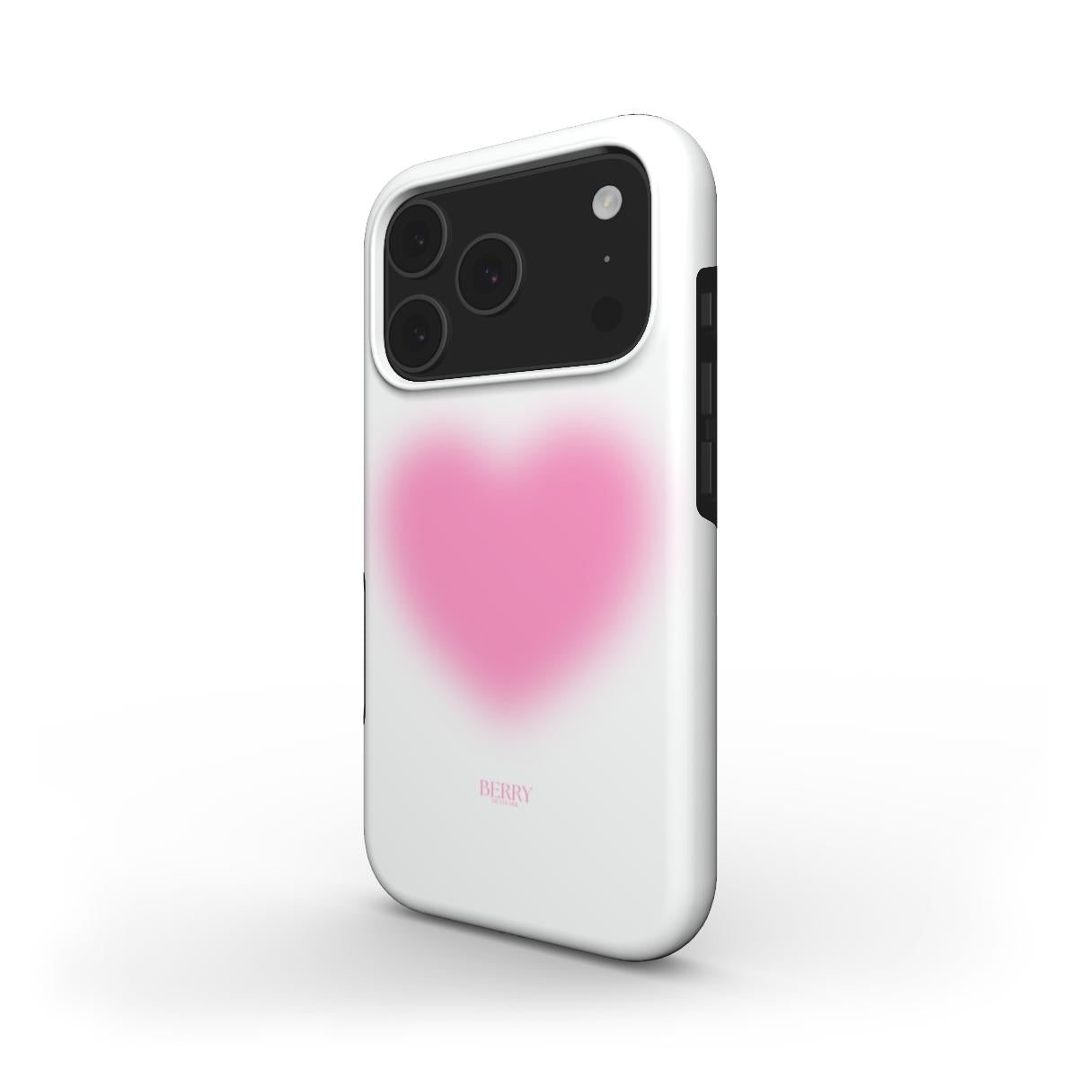 Trendy white phone case with a soft, blurry pink heart design, showcasing a feminine and aesthetic style perfect for that girly look.