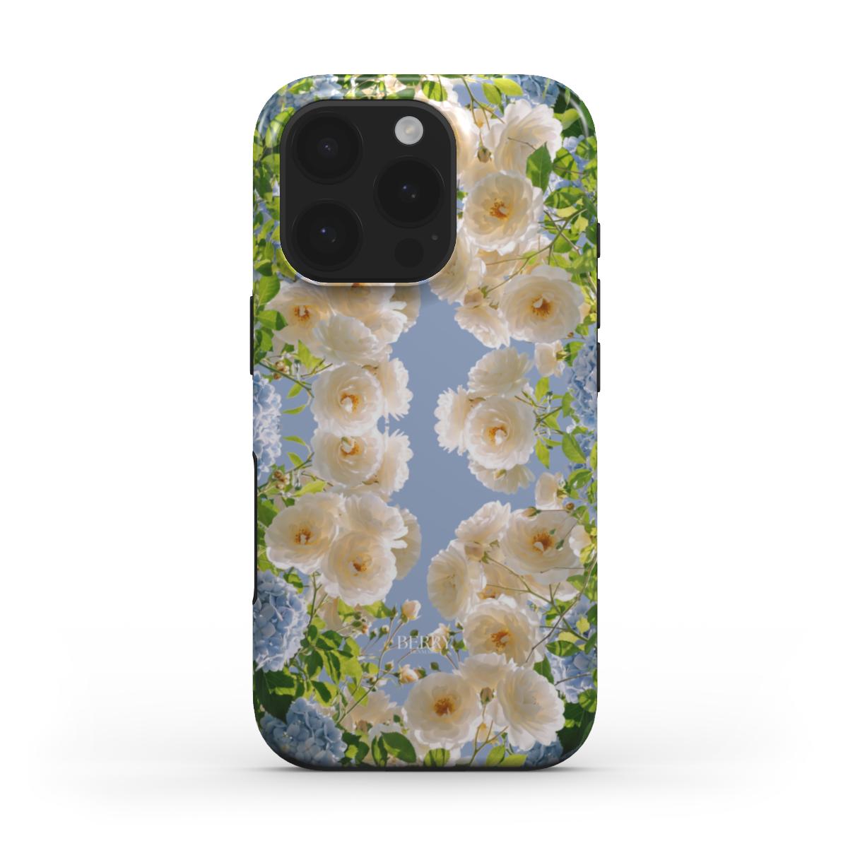 Trendy phone case with white, blue, beige, and multicolored floral pattern inspired by spring, offering a feminine and beautiful aesthetic.
