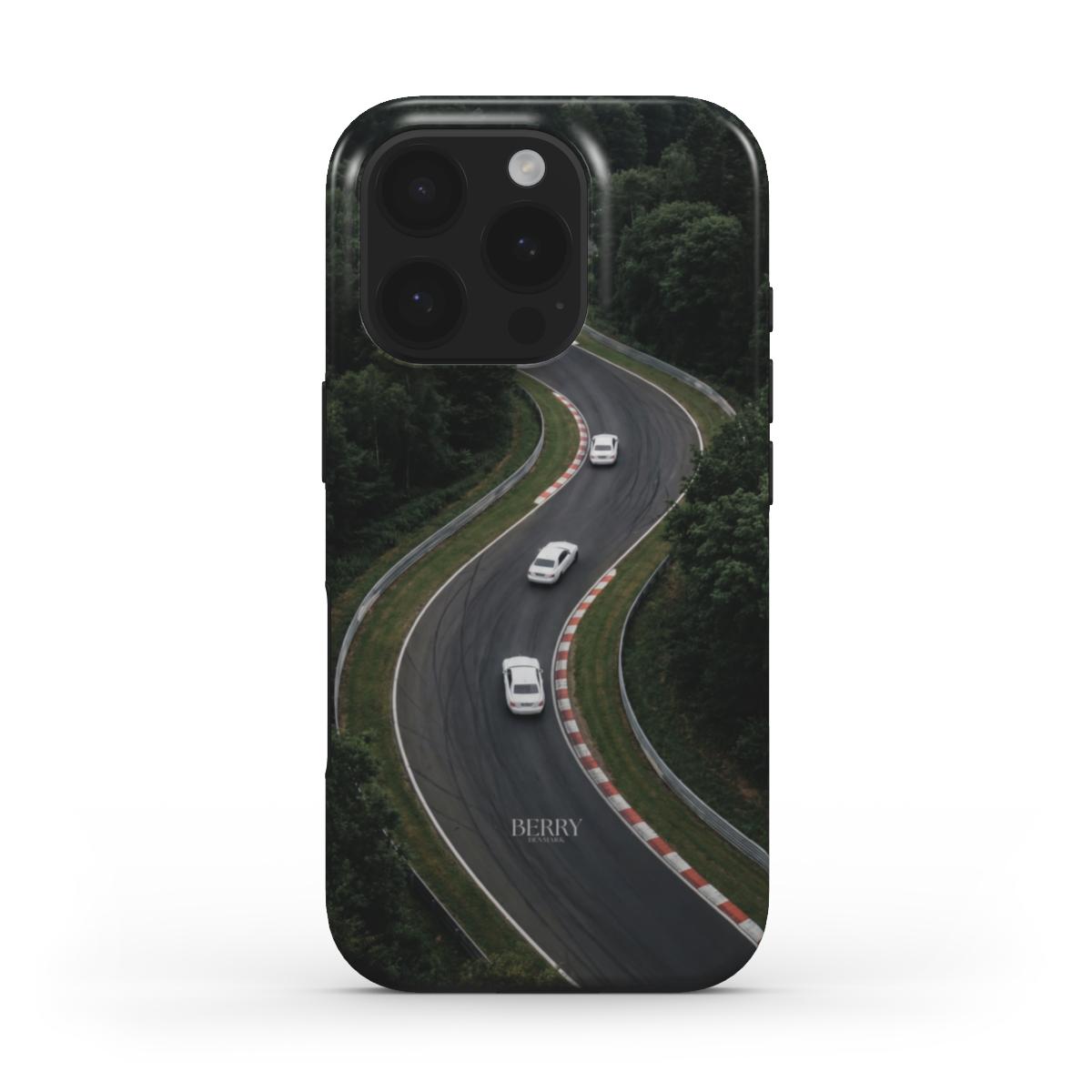 Trendy phone case in green and black featuring a winding road with white cars, combining stylish feminine charm with a sleek, popular design.