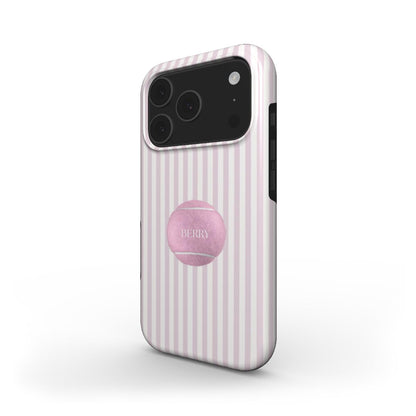 Trendy phone case with white and pink vertical stripes featuring a stylish pink tennis ball design, combining girly charm with modern sporty aesthetics.
