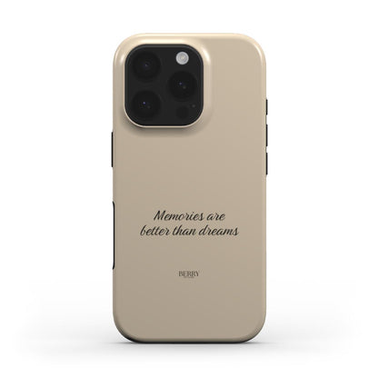 Beige trendy phone case with elegant script phrase "Memories are better than dreams," offering a feminine, aesthetic, and popular stylish accessory.