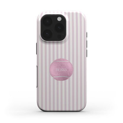 Trendy phone case with white and pink vertical stripes featuring a pink tennis ball design, combining feminine and sporty aesthetic for a popular stylish look.